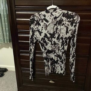 Neck cut-out and keyhole sweater